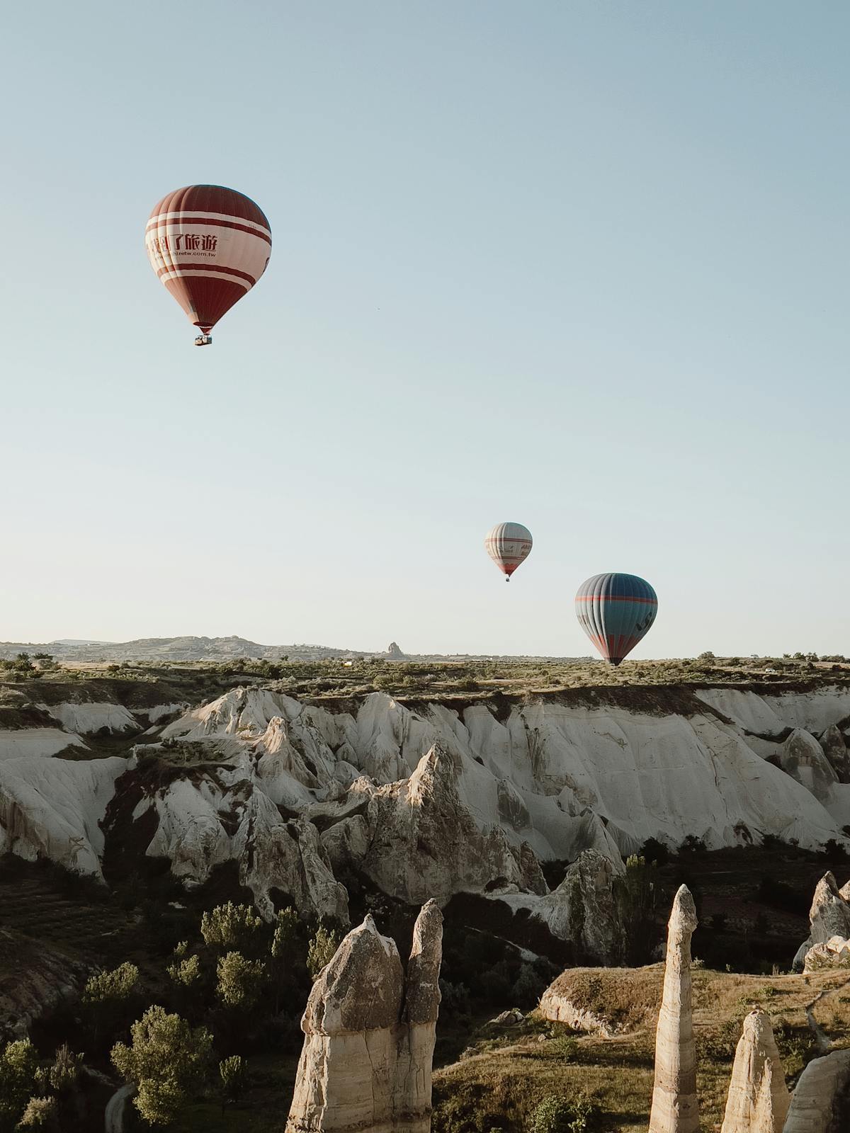Fairy chimneys with balloons in the distance